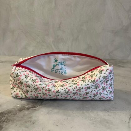 Neceser Coral fundación Caico