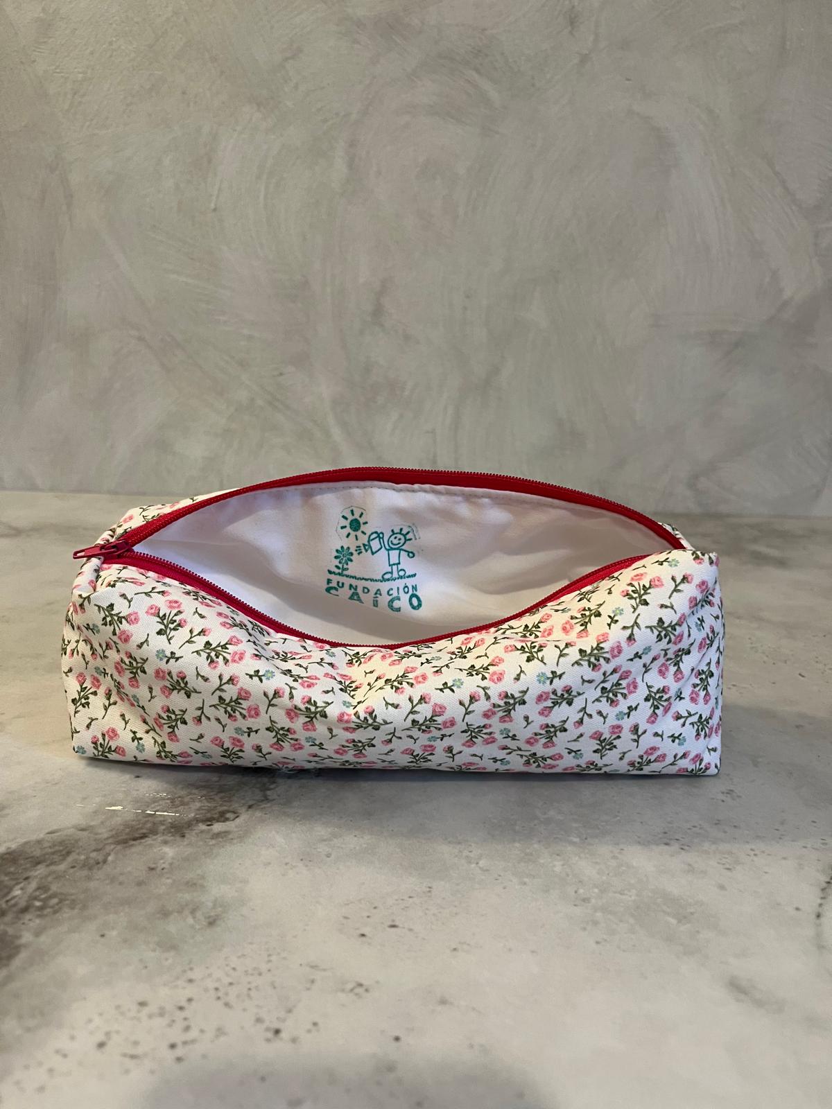 Neceser Coral fundación Caico